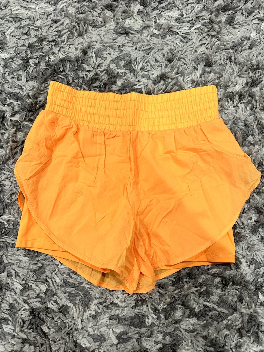 high waisted orange athletic shorts